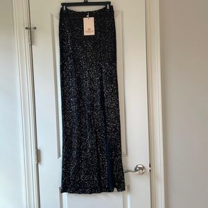 Brand new long sequin skirt with high slit